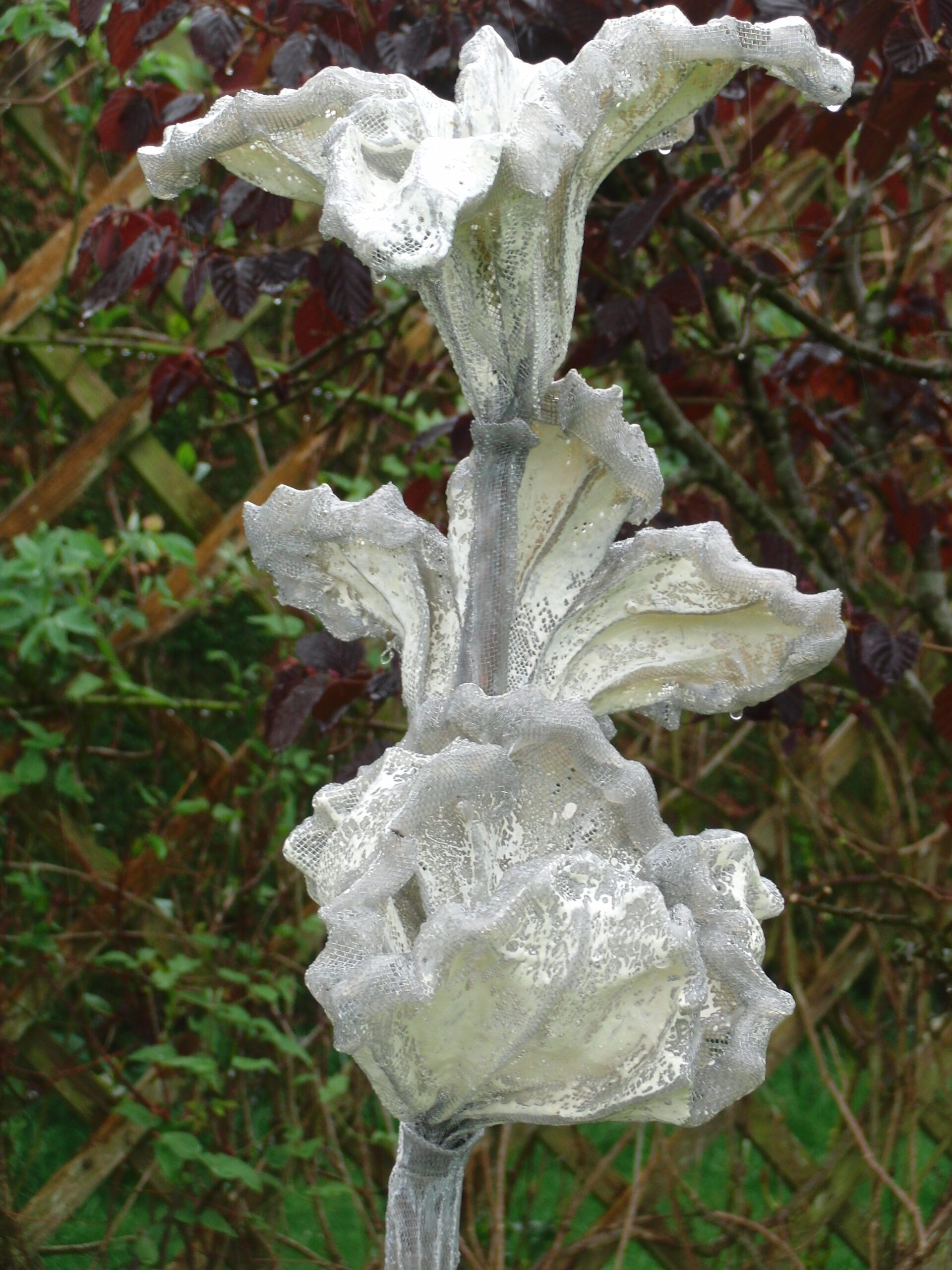 white flora by Sculptor Carole Andrews