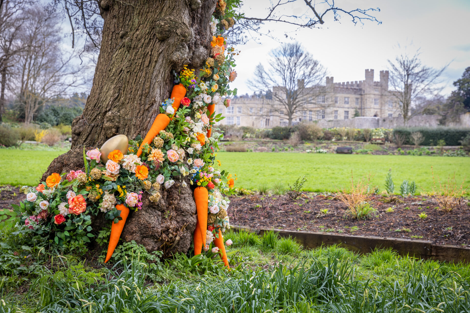 Tree decorated with flowers and carrots
